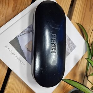 Fendi oval black glasses case.